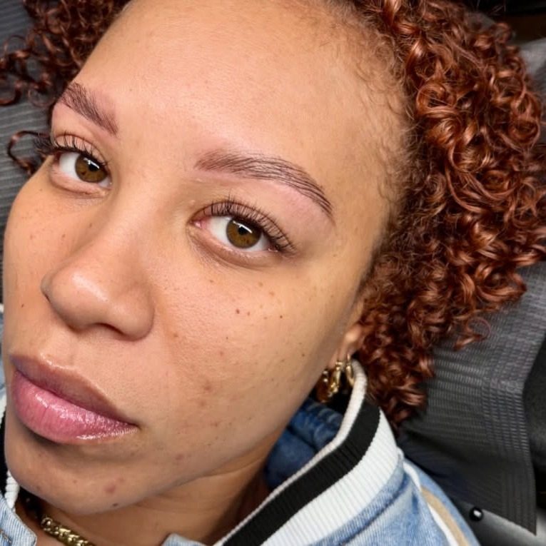 Client with laminated, lifted brows and natural lashes
